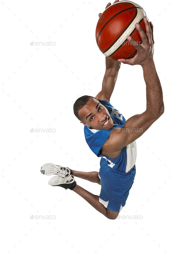 Full length portrait of a basketball player with ball - Stock Photo - Images