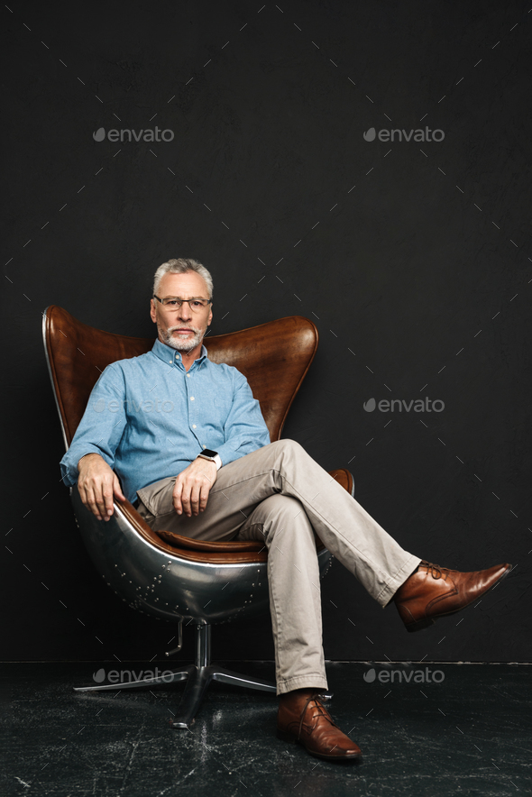 Full length photo of mature stylish man 60s with grey hair and b - Stock Photo - Images