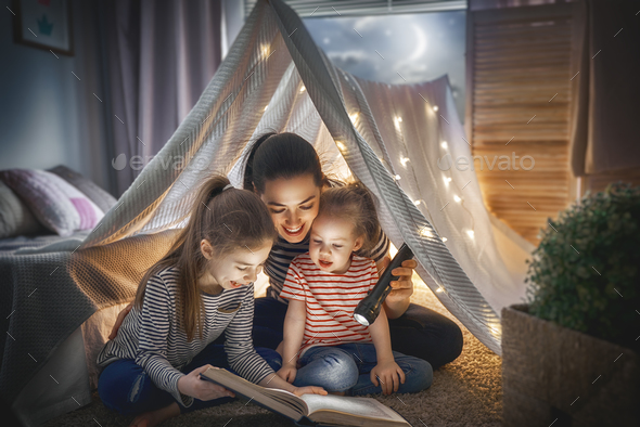 Mom and children reading book Stock Photo by choreograph | PhotoDune