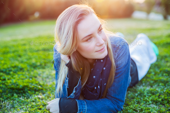 Beautiful woman relaxing outdoors - Stock Photo - Images