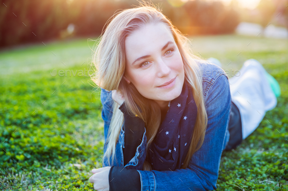 Beautiful woman relaxing outdoors - Stock Photo - Images