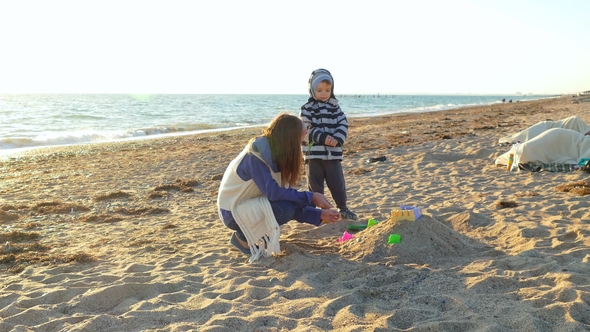 Children Make a Castle of Sand