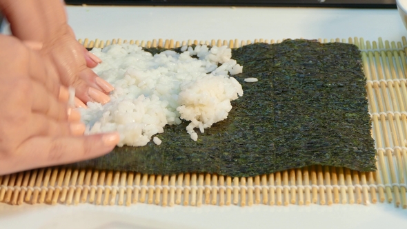 Cooking Sushi Rolls. Fast Moving