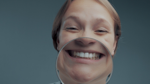 Portrait of Caucasian Wooman with Magnifier