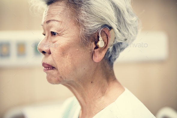 An elderly woman with hearing aid Stock Photo by Rawpixel | PhotoDune