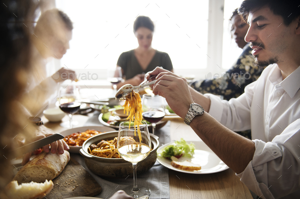 Friends gathering having Italian food together Stock Photo by Rawpixel
