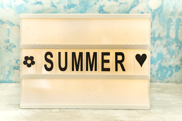 Summer letter on the led board on table. Concept of summer tourism, travel and vacation - Stock Photo - Images