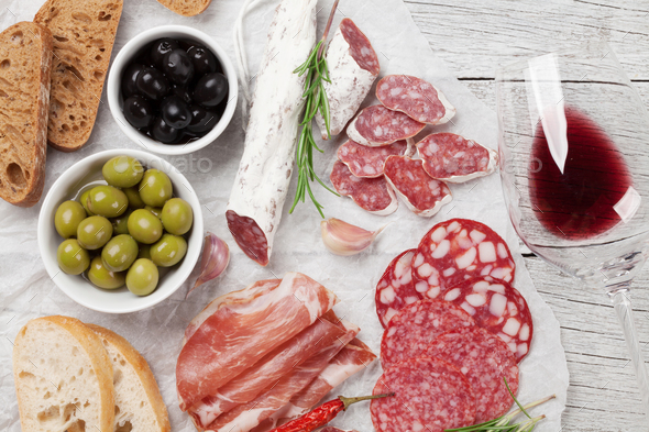 Salami, ham, sausage, prosciutto and wine - Stock Photo - Images