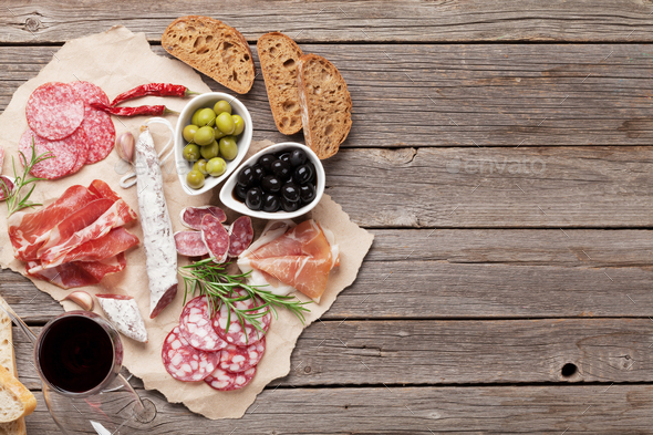 Salami, sausage, prosciutto and wine - Stock Photo - Images