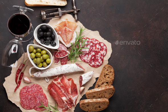 Salami, ham, sausage, prosciutto and wine - Stock Photo - Images