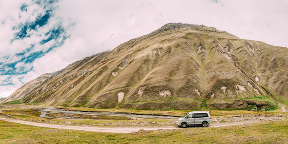 SUV Car On Off Road In Spring Mountains Landscape In Truso Gorge - Stock Photo - Images