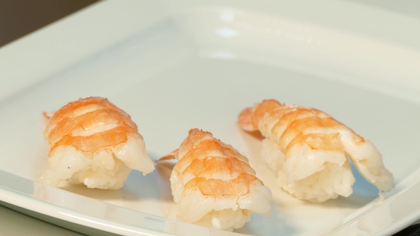 Lie Down Sushi with Shrimp on a Plate