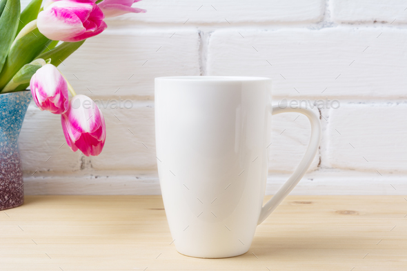 White coffee cappuccino mug mockup with magenta pink tulips - Stock Photo - Images