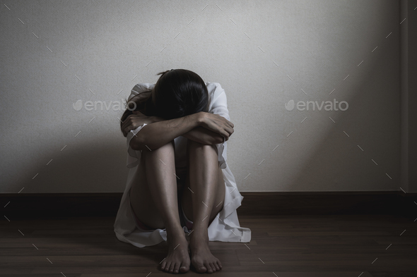 Depressed And Stressed Woman Sitting On The Floor Alone Stock Photo By