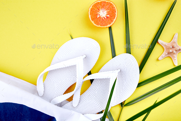 Summer beach bag with flip flops, - Stock Photo - Images