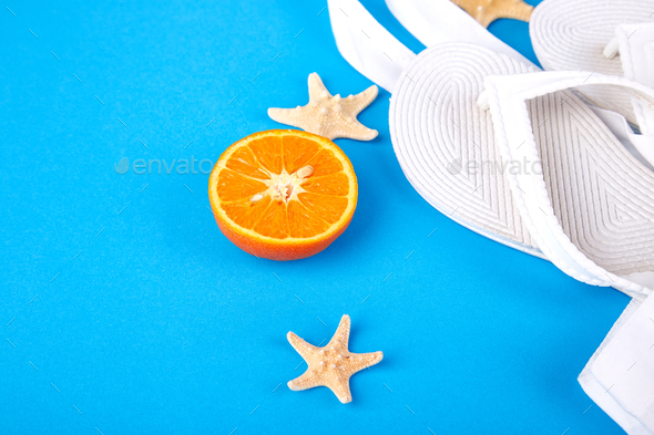 Summer beach bag with flip flops, - Stock Photo - Images