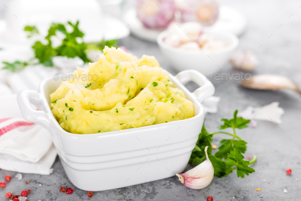 Mashed potato. Potato mash with garlic and parsley. Boiled potato. Potato puree Stock Photo by sea_wave