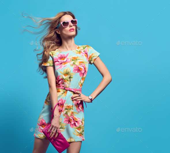 Fashion Young woman.Floral Dress, Heels, Hairstyle - Stock Photo - Images