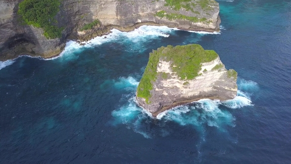 Aerial: Small Rock Island Near Nusa Penida - Popular Tourist Destination in Indonesia. .