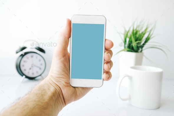 Mobile phone morning routine - Stock Photo - Images