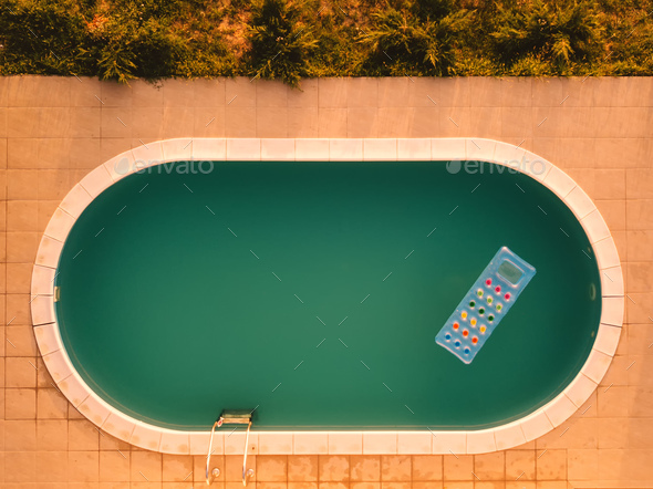 Aerial view of inflatable mattress in swimming pool - Stock Photo - Images