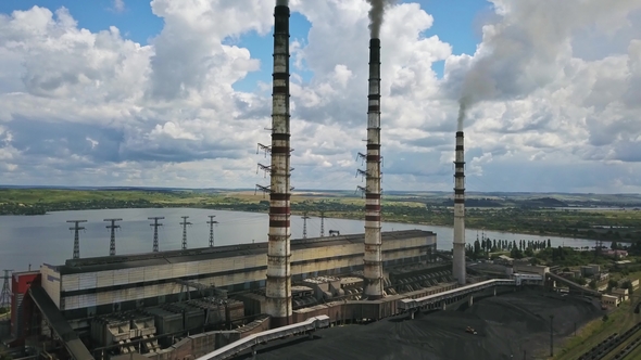 Power Station with Steaming Chimneys