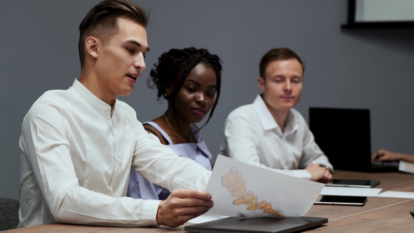 Beautiful Blonde Director of the Corporation Listens to the Financial Statements alt