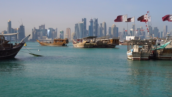 The Mix of Ages. View on Doha Modern City Skyline. Day Shot, Qatar, Middle East. Traditional Wooden
