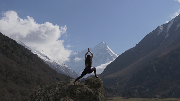 Yoga Pose in a Mountain Gorge in Nature