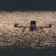 Homemade Drone in the Background of the Water at Sunset - VideoHive Item for Sale