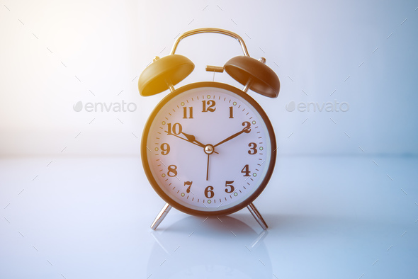 Retro style analog black alarm clock Stock Photo by stevanovicigor