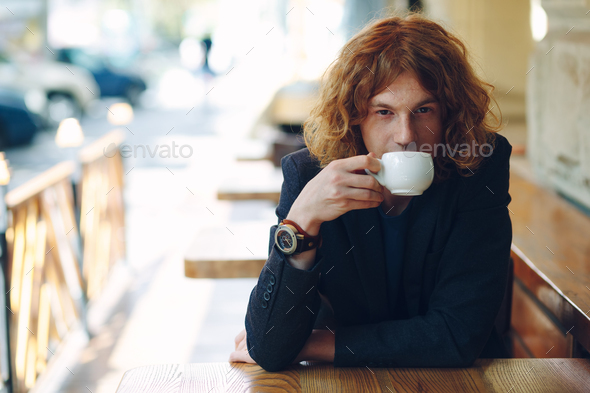 Portrait fashionable man drinking coffee Stock Photo by arthurhidden