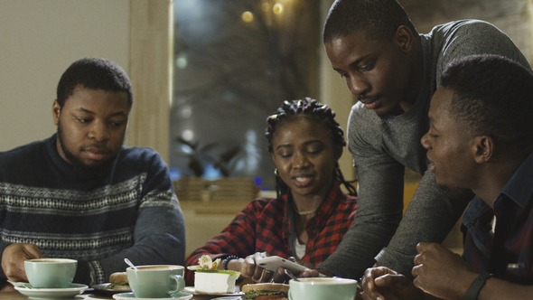 Black People Having Fun in Cafeteria alt