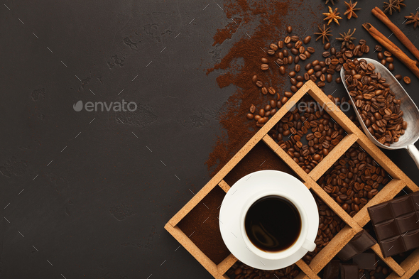 Top view on scattered coffee beans and spices, background with c - Stock Photo - Images