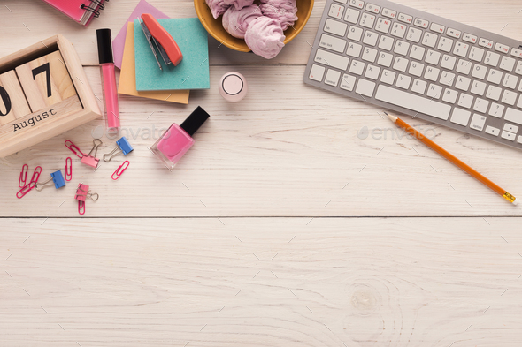 Desk with keyboard, stationery and sweets, top view - Stock Photo - Images