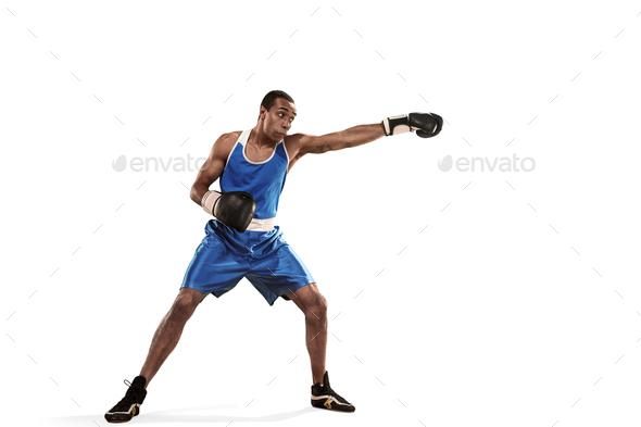 Sporty man during boxing exercise making hit. Photo of boxer on white background - Stock Photo - Images