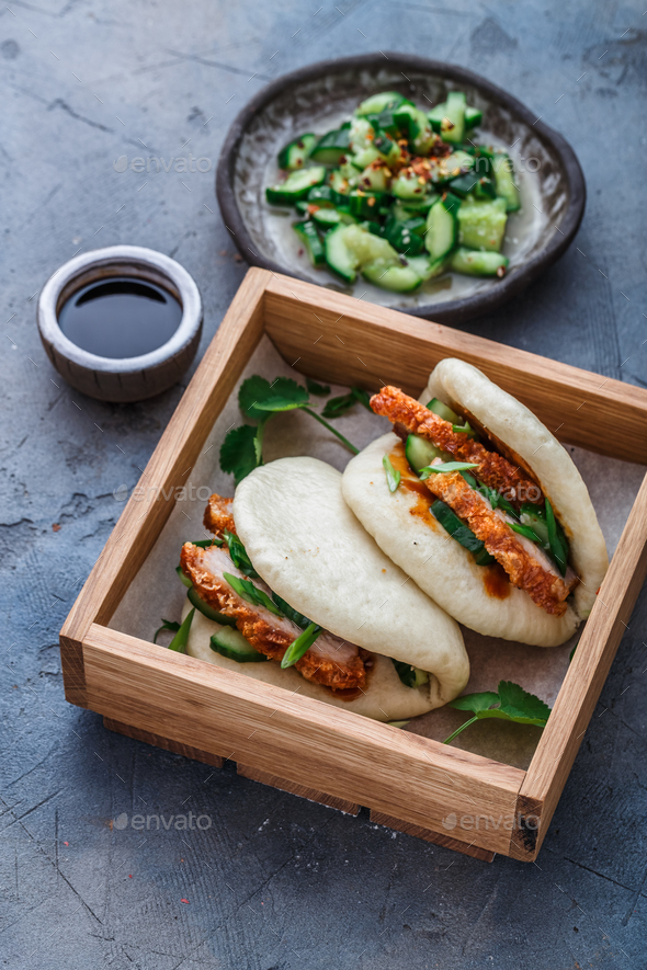 Gua bao, chinese steamed buns, with pork belly in a wooden box Stock ...