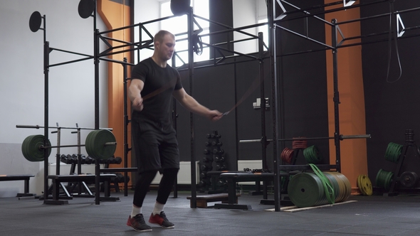 Male Athlete Doing Double Jumps Rope in Cross Fit Gym