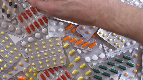 Many Pills and Tablet. A Lot of Medicinal Drugs. Medication Capsule Color Background. Medicament. alt