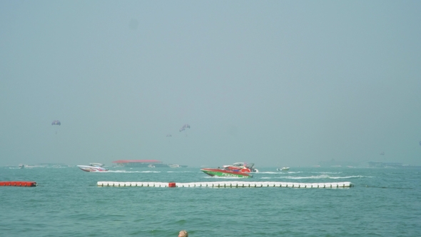 View of Busy Sky and Sea in Pattaya Beach and Buoys Separating Zone of Bathing