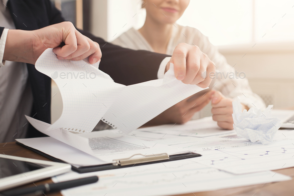 Angry businessman tearing up a document Stock Photo by Milkosx | PhotoDune