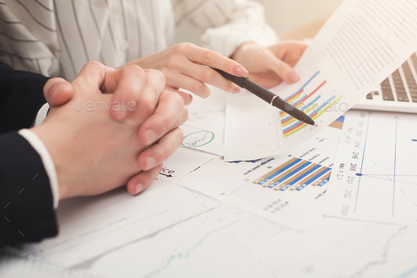 Business colleagues working with documents - Stock Photo - Images