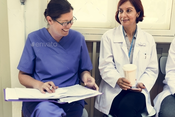 Medical professionals having a conversation Stock Photo by Rawpixel