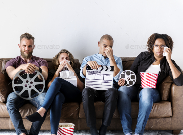Group of friends watching a drama movie