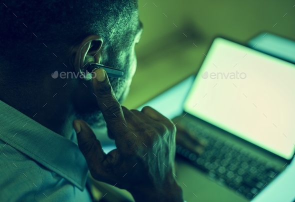 A man using bluetooth earphone device to communicate Stock Photo by Rawpixel