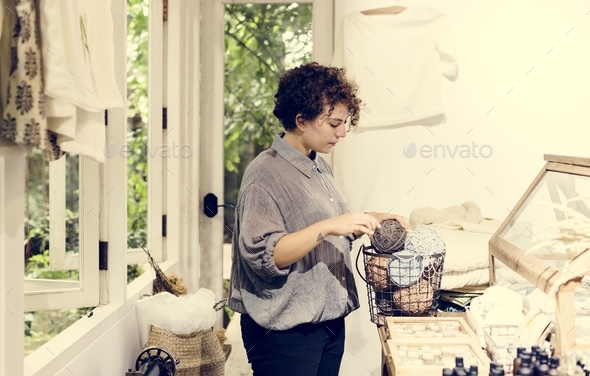 An entrepreneur woman in a clothe shop Stock Photo by Rawpixel | PhotoDune