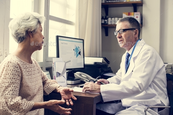 Doctor with a patient - Stock Photo - Images