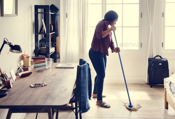 Black woman cleaning room Stock Photo by Rawpixel | PhotoDune