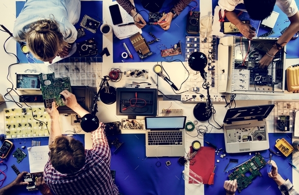 Aerial view of electronics technicians team working Stock Photo by Rawpixel
