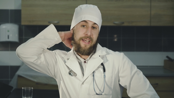 Portrait of Doctor Explaining to Camera about Healthcare alt